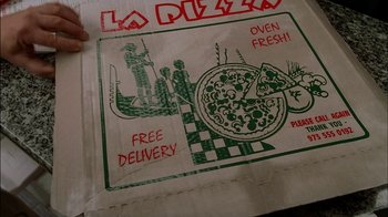 Movie still from “The Sopranos” (1999), created by David Chase – A bag of pizza; Extreme Close Up shot, High angle