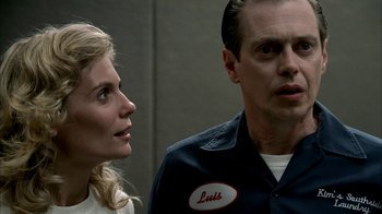 Movie still from “The Sopranos” (1999), created by David Chase – A man and a woman standing next to each other; Close Up shot, Over the shoulder angle