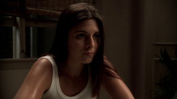 Movie still from “The Sopranos” (1999), created by David Chase – A beautiful young lady sitting in front of a window; Close Up shot, Low angle