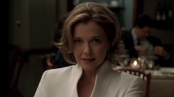 Movie still from “The Sopranos” (1999), created by David Chase – A person wearing a white jacket; Close Up shot, Low angle