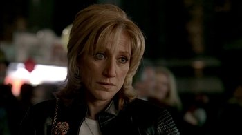 Movie still from “The Sopranos” (1999), created by David Chase – A person wearing a leather jacket; Close Up shot, Over the shoulder angle