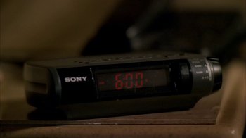 Movie still from “The Sopranos” (1999), created by David Chase – An alarm clock on the table; Extreme Close Up shot, High angle