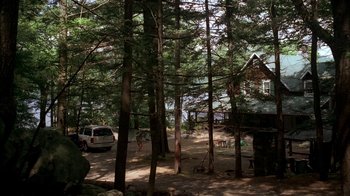 Movie still from “The Sopranos” (1999), created by David Chase – A car parked in the middle of a wooded area; Extreme Wide shot, High angle