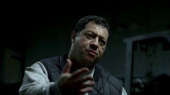 Movie still from “The Sopranos” (1999), created by David Chase – A person talking to someone; Close Up shot, Low angle