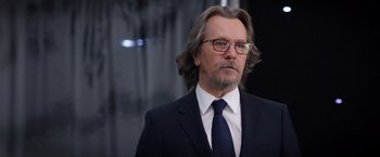 Movie still from “The Space Between Us” (2017), directed by Peter Chelsom – A person wearing a suit and tie; Close Up shot, Over the shoulder angle