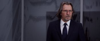 Movie still from “The Space Between Us” (2017), directed by Peter Chelsom – A person wearing a suit and tie; Close Up shot, Over the shoulder angle