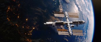 Movie still from “The Space Between Us” (2017), directed by Peter Chelsom – A view of the earth from the space station; Extreme Wide shot, Overhead angle