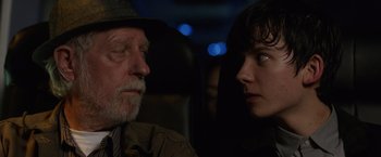 Movie still from “The Space Between Us” (2017), directed by Peter Chelsom – A man and a woman sitting next to each other; Close Up shot, Over the shoulder angle