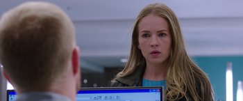 Movie still from “The Space Between Us” (2017), directed by Peter Chelsom – A woman looking at a computer screen while sitting down; Close Up shot, Over the shoulder angle