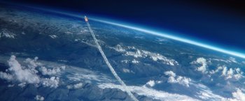 Movie still from “The Space Between Us” (2017), directed by Peter Chelsom – An image of an airplane flying in the sky above the clouds; Extreme Wide shot, Low angle