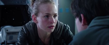 Movie still from “The Space Between Us” (2017), directed by Peter Chelsom – A young woman is looking at the camera; Close Up shot, Over the shoulder angle