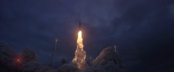 Movie still from “The Space Between Us” (2017), directed by Peter Chelsom – A rocket is being launched into the night sky; Extreme Wide shot, Low angle