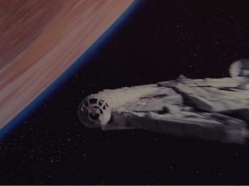 Movie still from “The Star Wars Holiday Special” (1978), directed by Steve Binder – A space ship in the middle of the night sky; Extreme Wide shot, Overhead angle