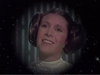 Movie still from “The Star Wars Holiday Special” (1978), directed by Steve Binder – A person wearing a star wars costume; Close Up shot, Low angle