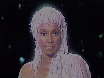Movie still from “The Star Wars Holiday Special” (1978), directed by Steve Binder – A person wearing a wig; Close Up shot, High angle