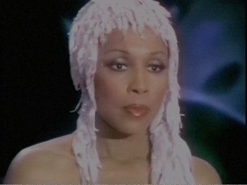 Movie still from “The Star Wars Holiday Special” (1978), directed by Steve Binder – A person wearing a wig; Close Up shot, Low angle