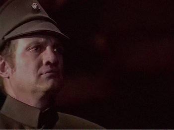 Movie still from “The Star Wars Holiday Special” (1978), directed by Steve Binder – A person wearing a uniform; Close Up shot, Low angle