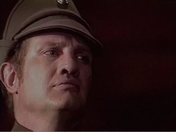 Movie still from “The Star Wars Holiday Special” (1978), directed by Steve Binder – A person wearing a hat; Close Up shot, Low angle