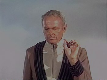 Movie still from “The Star Wars Holiday Special” (1978), directed by Steve Binder – An older man holding a cigarette in his hand; Close Up shot, Low angle