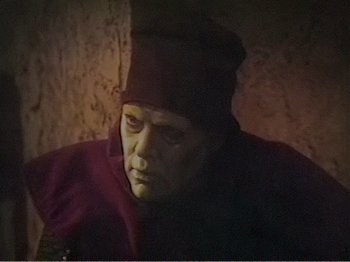 Movie still from “The Star Wars Holiday Special” (1978), directed by Steve Binder – A man in a red shirt and a red hat; Medium shot, Over the shoulder angle