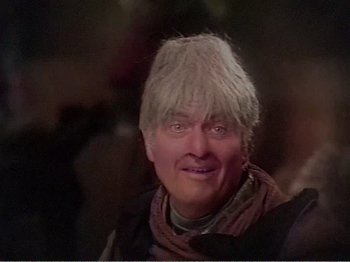 Movie still from “The Star Wars Holiday Special” (1978), directed by Steve Binder – A person wearing a hat; Close Up shot, Over the shoulder angle