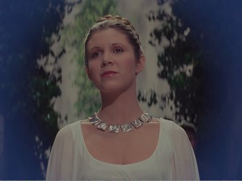 Movie still from “The Star Wars Holiday Special” (1978), directed by Steve Binder – A woman in a white dress and a silver necklace; Close Up shot, Low angle