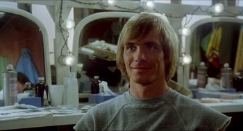 Movie still from “The Stunt Man” (1980), directed by Richard Rush – A man with blonde hair sitting in front of a mirror; Close Up shot, Over the shoulder angle