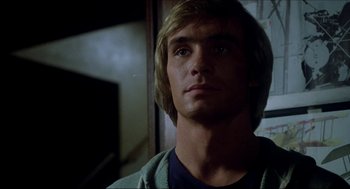 Movie still from “The Stunt Man” (1980), directed by Richard Rush – A person wearing a jacket; Close Up shot, Low angle