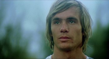 Movie still from “The Stunt Man” (1980), directed by Richard Rush – A person with long blonde hair; Close Up shot, Low angle