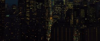 Movie still from “The Super” (2017), directed by Stephan Rick – A view of a city at night from above; Extreme Wide shot, High angle