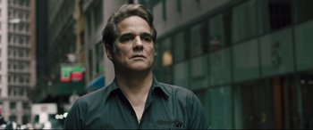 Movie still from “The Super” (2017), directed by Stephan Rick – A person wearing a black shirt; Close Up shot, Low angle