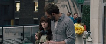 Movie still from “The Super” (2017), directed by Stephan Rick – A man and a woman standing next to each other; Close Up shot, Over the shoulder angle