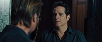 Movie still from “The Super” (2017), directed by Stephan Rick – A man in a black shirt is talking to another man; Close Up shot, Over the shoulder angle