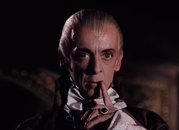 Movie still from “The Tales of Hoffmann” (1951), directed by Michael Powell – A person wearing a vampire costume; Close Up shot, Low angle