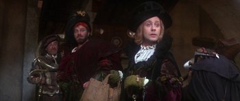 Movie still from “The Taming of The Shrew” (1967), directed by Franco Zeffirelli – A man and a woman dressed in renaissance costumes; Medium shot, Low angle