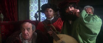 Movie still from “The Taming of The Shrew” (1967), directed by Franco Zeffirelli – A group of people dressed up as pirates; Medium shot, Over the shoulder angle