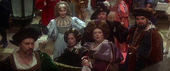 Movie still from “The Taming of The Shrew” (1967), directed by Franco Zeffirelli – A group of people dressed up in costumes; Medium shot, High angle