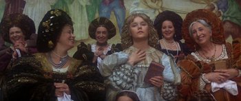 Movie still from “The Taming of The Shrew” (1967), directed by Franco Zeffirelli – A group of people dressed in renaissance clothing; Medium shot, Over the shoulder angle