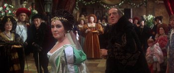 Movie still from “The Taming of The Shrew” (1967), directed by Franco Zeffirelli – A man and a woman dressed in renaissance clothing; Medium shot, Over the shoulder angle
