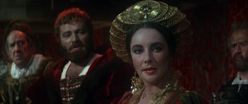 Movie still from “The Taming of The Shrew” (1967), directed by Franco Zeffirelli – A man and a woman in costume in a theater; Close Up shot, Over the shoulder angle