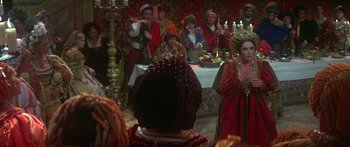 Movie still from “The Taming of The Shrew” (1967), directed by Franco Zeffirelli – A group of people dressed in medieval costumes; Medium shot, Over the shoulder angle