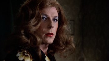 Movie still from “The Tenant” (1976), directed by Roman Polanski – A person with long hair; Close Up shot, Over the shoulder angle