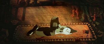 Movie still from “The Thief and the Cobbler” (1993), directed by Richard Williams – An animated character laying on the ground in a room; Wide shot, Overhead angle