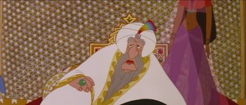 Movie still from “The Thief and the Cobbler” (1993), directed by Richard Williams – An old man with a beard is sitting on a throne; Close Up shot, High angle