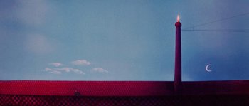 Movie still from “The Thief and the Cobbler” (1993), directed by Richard Williams – A person standing on top of a fence near a building; Extreme Wide shot, Low angle