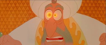 Movie still from “The Thief and the Cobbler” (1993), directed by Richard Williams – An animated picture of a man with a hat on; Extreme Close Up shot, High angle