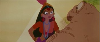 Movie still from “The Thief and the Cobbler” (1993), directed by Richard Williams – A woman in a red shirt and a necklace; Close Up shot, Over the shoulder angle