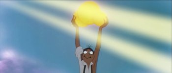 Movie still from “The Thief and the Cobbler” (1993), directed by Richard Williams – A man holding up a yellow object in the air; Medium shot, Low angle