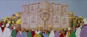 Movie still from “The Thief and the Cobbler” (1993), directed by Richard Williams – A crowd of people standing around a building; Extreme Wide shot, Low angle