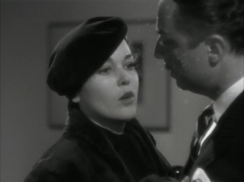 Movie still from “The Thin Man” (1934), directed by W.S. Van Dyke – A man and a woman are looking at one another; Close Up shot, High angle